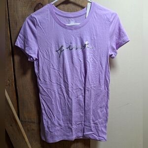 A Pink Victoria Secrets short sleeve purple t-shirt in a size X-Small. NWT.